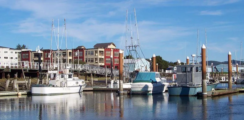 Boats and waterfront buildings along the Siuslaw River in Florence